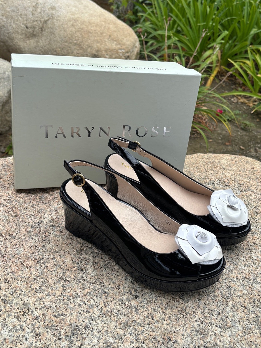 Size 9 Taryn Rose Black Patent Slingback Wedge with White Flower.like new.